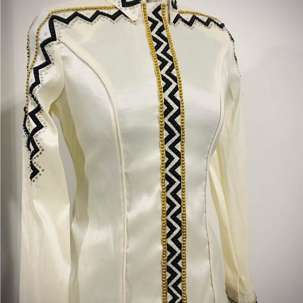 Chic Cream Top with Black and Gold Details